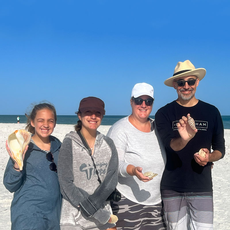 happy family on their Marco Island private Shelling boat tour