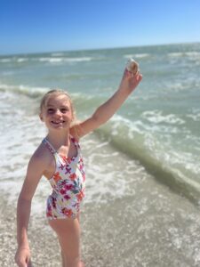 Finding sand dollars on a sand bar beach in the 10,000 Islands