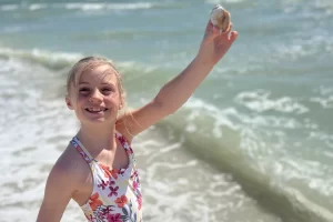 Kids love finding shells on Marco's beaches