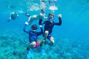 kids exploring under the water