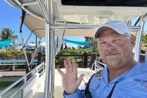 Capt Nate at the Crabby Lady with some boat tour guests