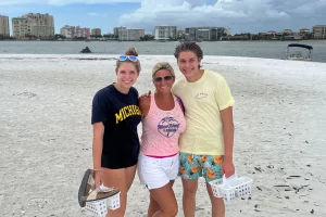 Family fun shelling on a barrier island shell bar