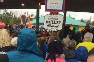 Busy day in the rain at the 2009 Mullet Festival