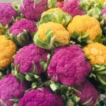 Colorful cauliflower heads at the SWFL Produce stand