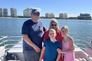 Family picture time with Marco Island waterfront for a backdrop
