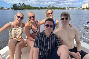 Family visiting from Germany enjoying a family boat tour in Goodland